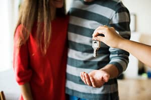 a couple receiving a key